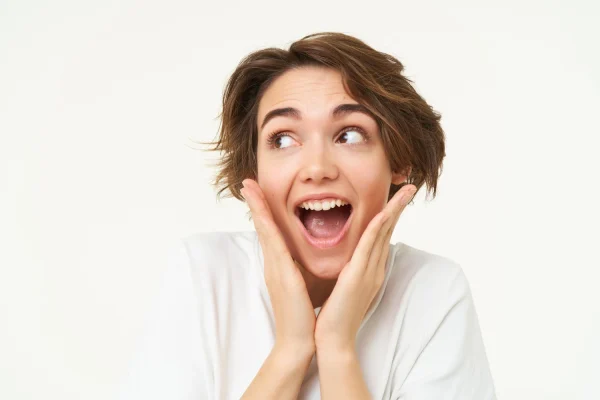 Woman excited about factors affecting Tirzepatide weight loss speed