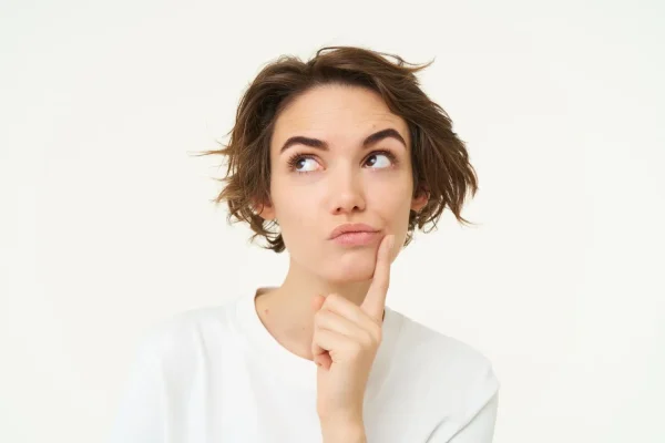 Woman wondering how to make her jawline filler results last longer