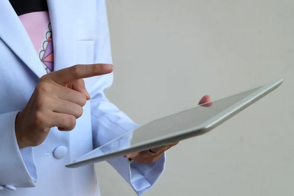 Doctor holding tablet , e-health concept , business concept