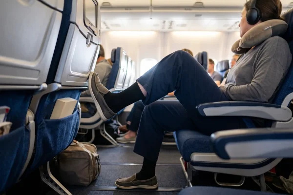 In-flight ankle exercise to lower clot risk after liposuction