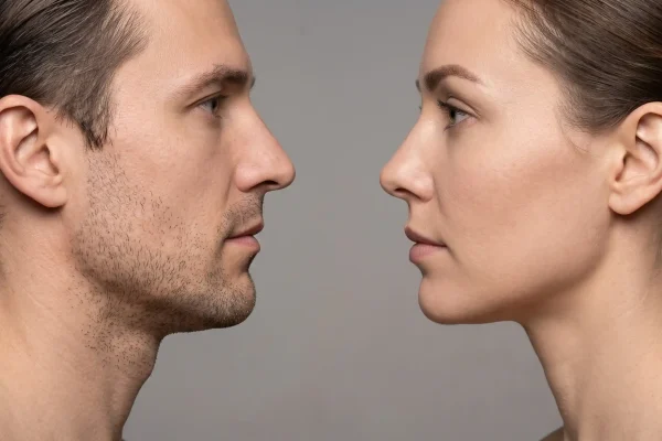 Male and female jawline profiles showing different filler width thresholds