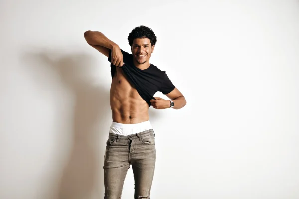 man showing off his abs