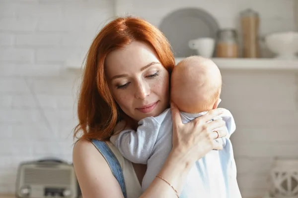 Mother and her child posing indoor