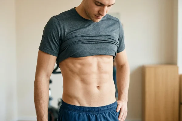 portrait of a man showing his tummy lipo