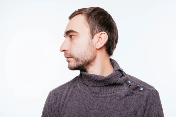 Side view of young man