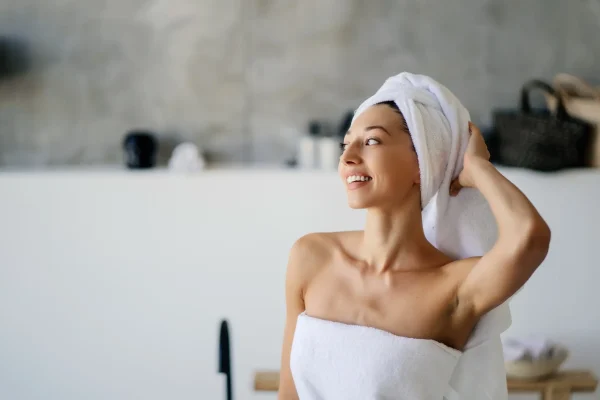 woman-taking-bath-after-neck-lipo
