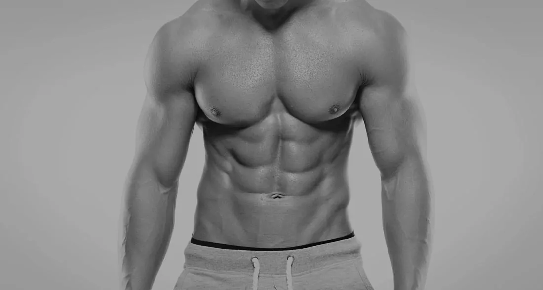 close up of man's chest and abs after liposuction