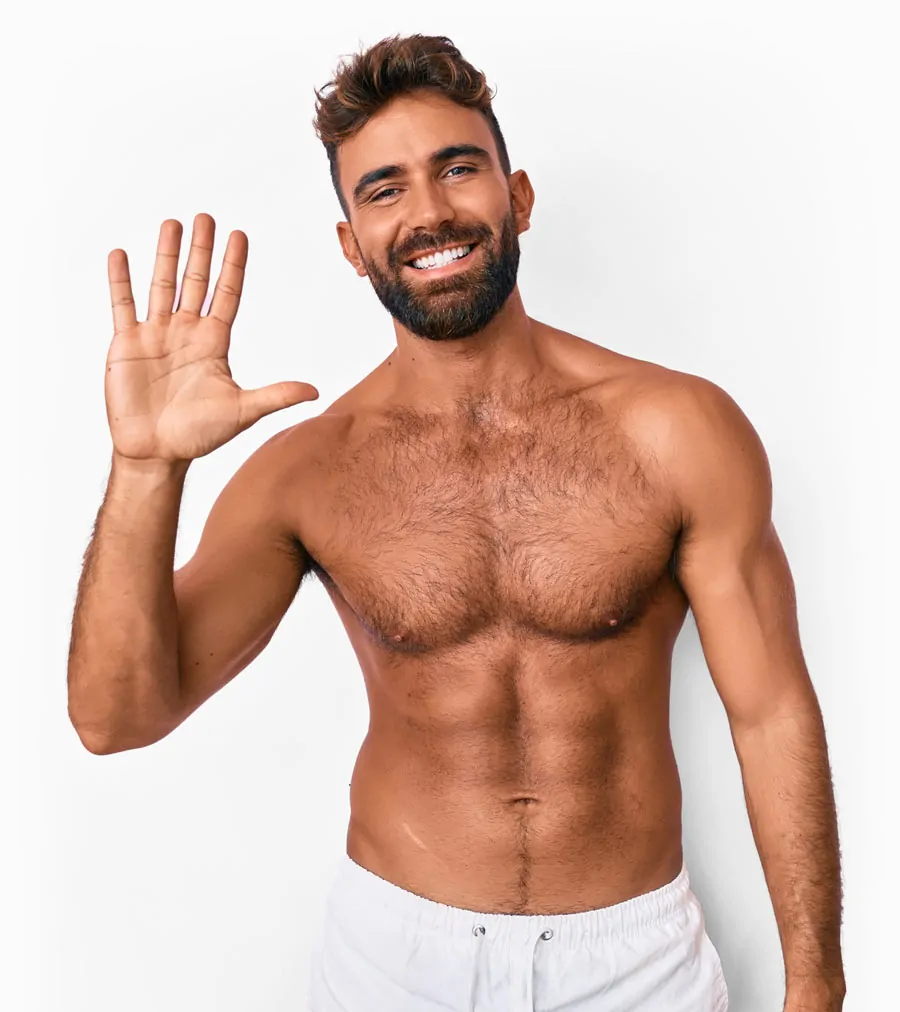 Smiling man waving with raised hand