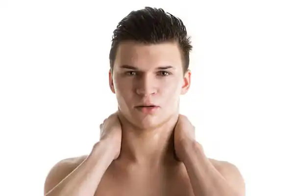 A man gaining confidence after a non-surgical jawline contouring procedure