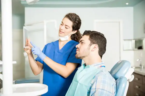 An aesthetic surgeon explaining how liposuction works