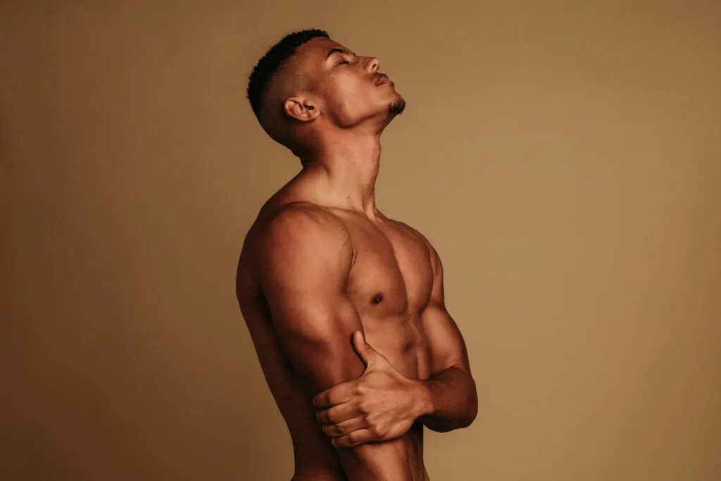 toned man with abs after plastic surgery