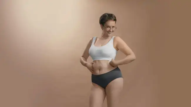 A woman happy with her new body shape