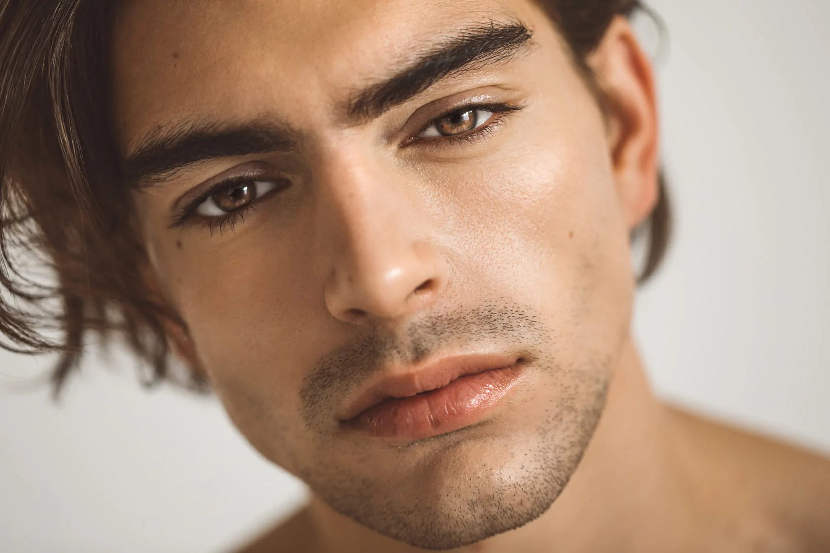 Close-up shot of a man after getting Botox