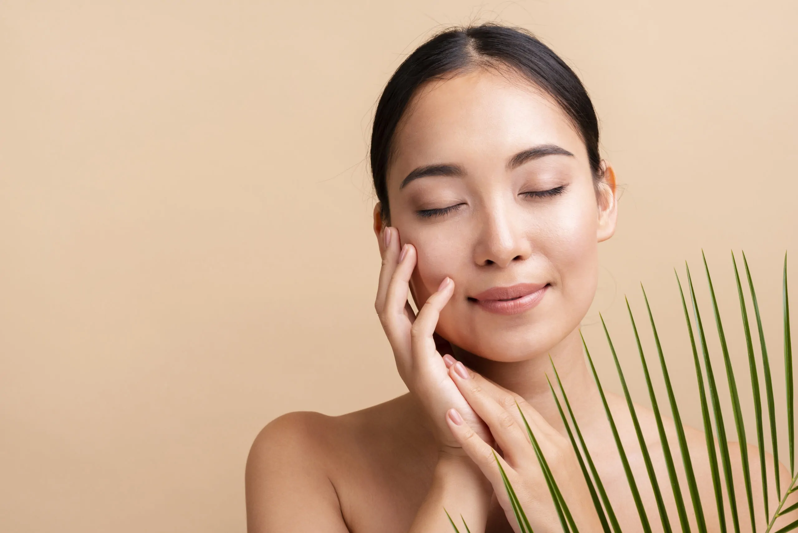 close-up-asian-woman-with-leaves