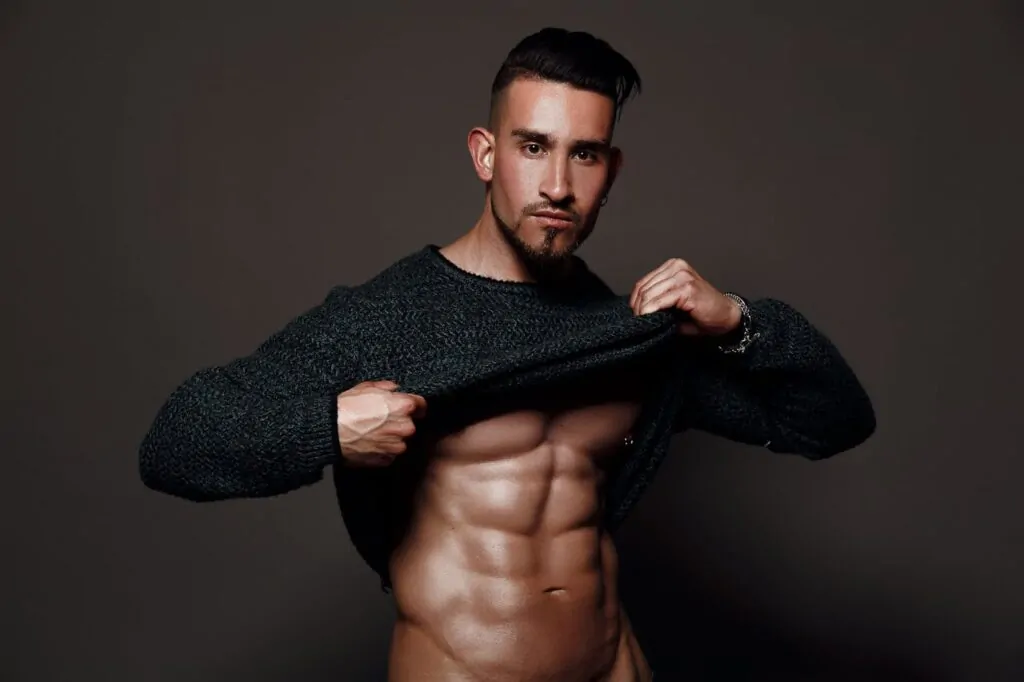 handsome man with abs after plastic surgery