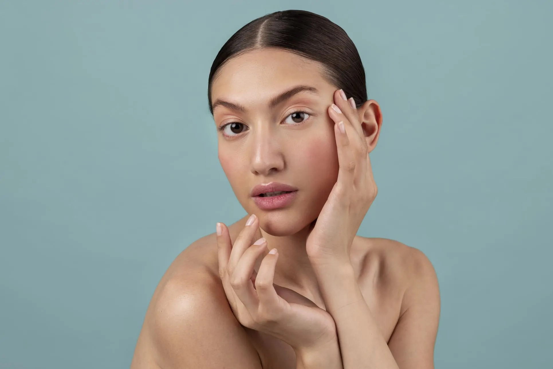 beautiful young woman posing after facetite