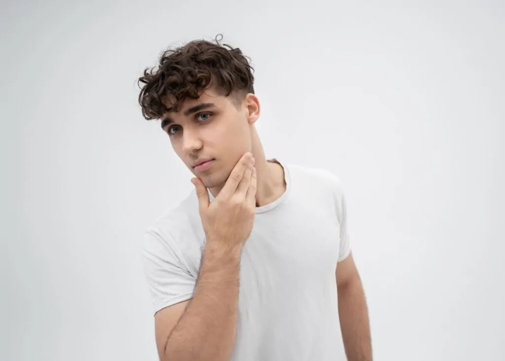 Handsome man posing after Neck Liposuction