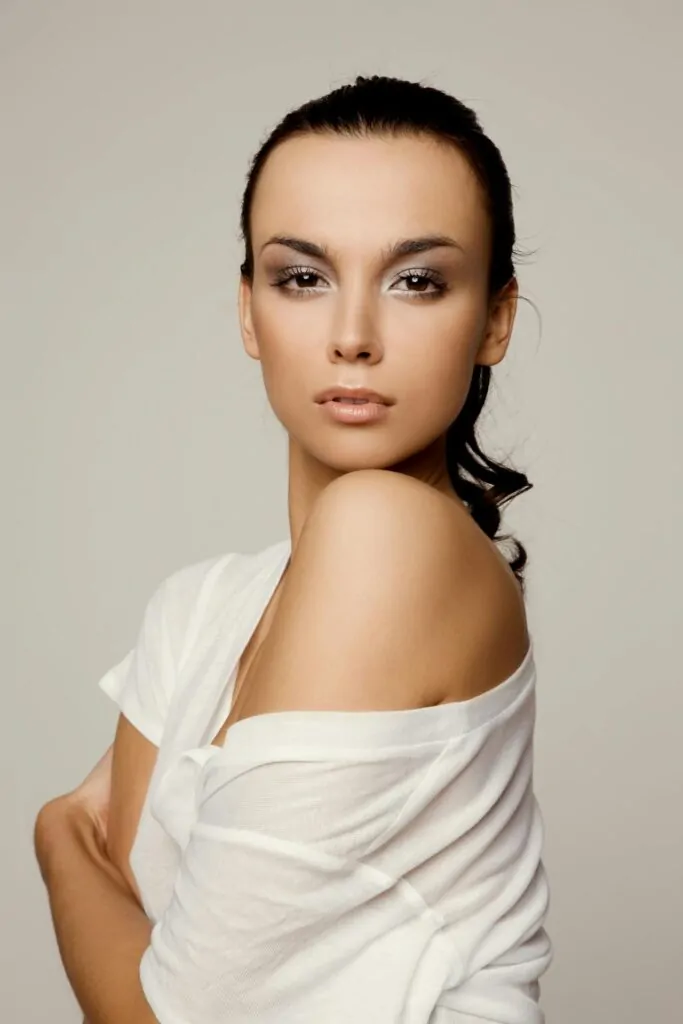 woman posing after having facial plastic surgery