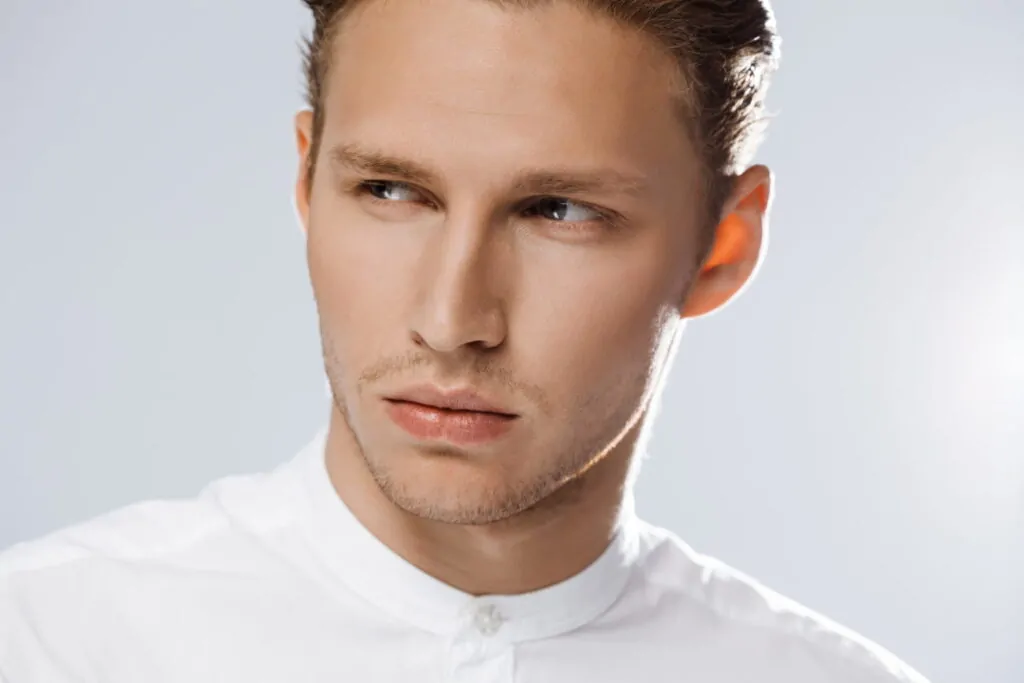 Man enjoying the results of his FaceTite procedure