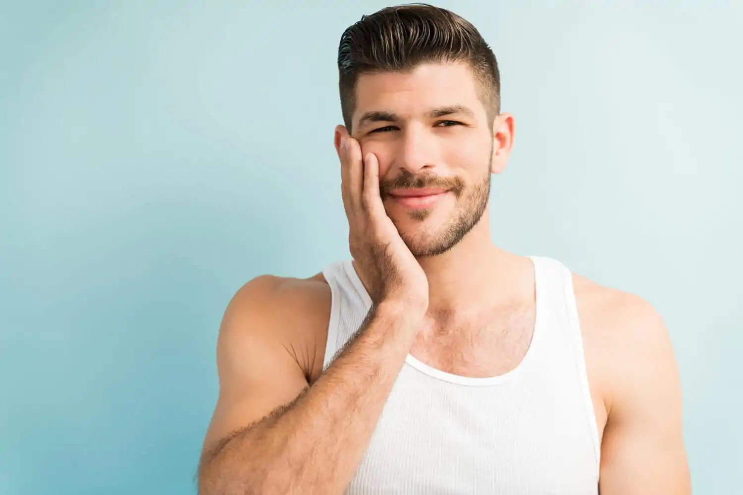Man smiling after seeing how HGH improved his skin