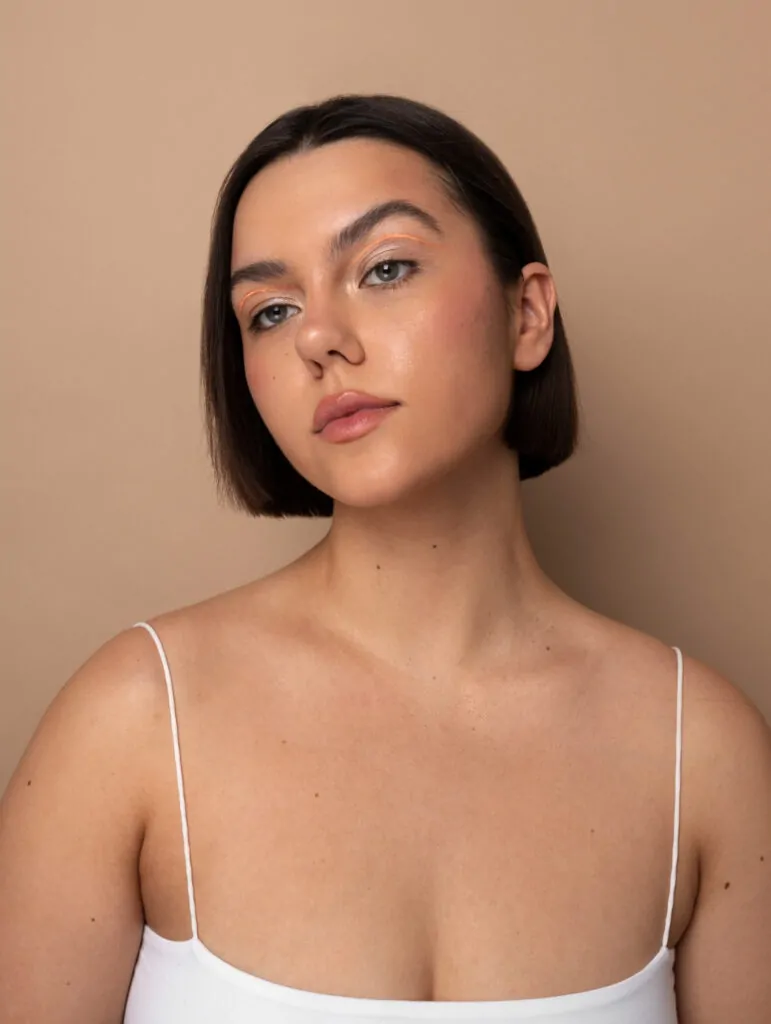 Front view young woman posing in studio