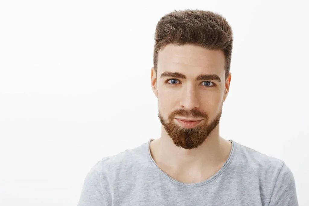 handsome and confident young man after getting plastic surgery