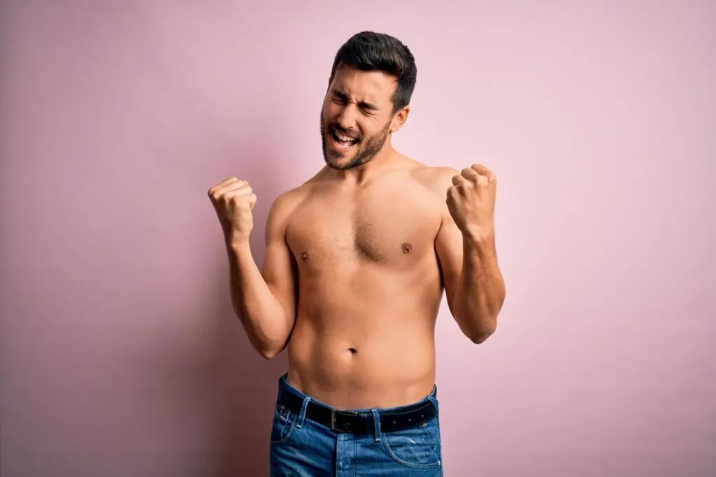 happy man with A Tummy Tuck result