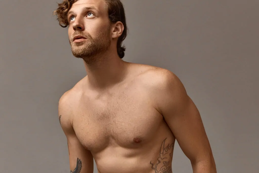 male with athletic torso posing