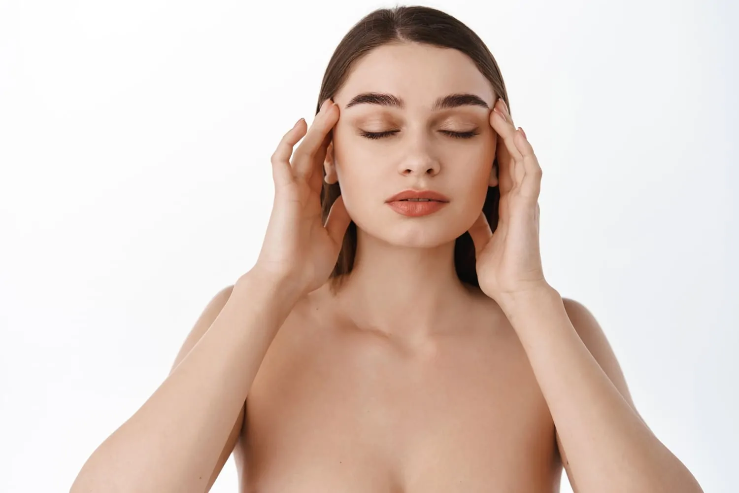 Woman touching her face