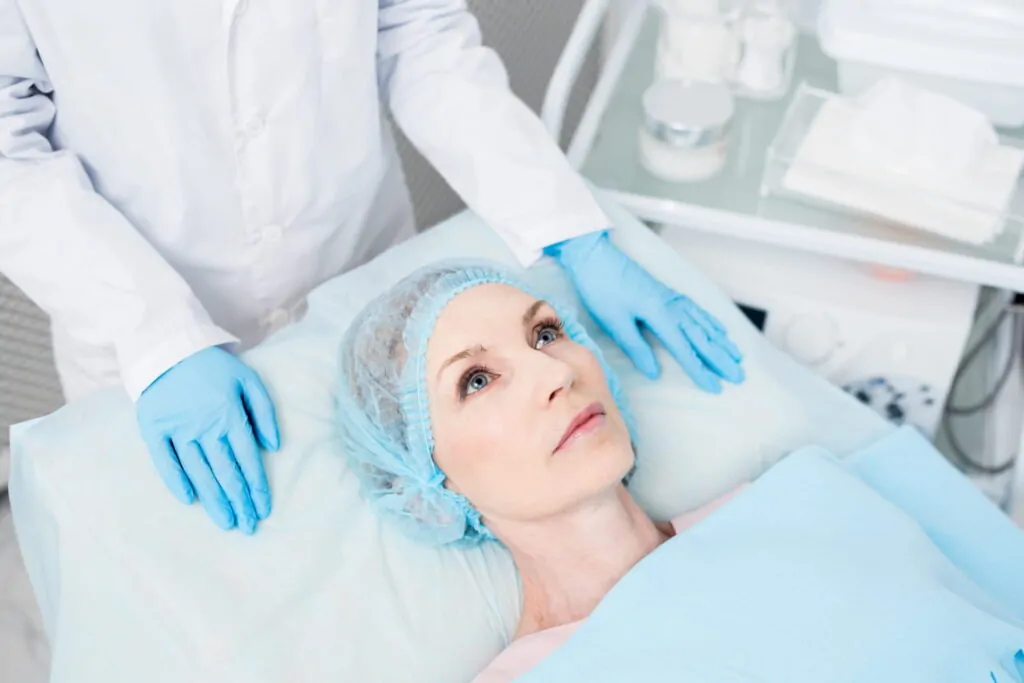 Senior woman during plastic surgery procedure