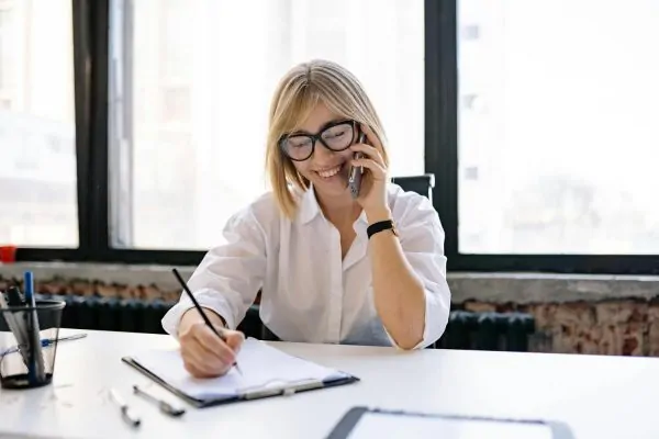 A woman taking notes for plastic surgery