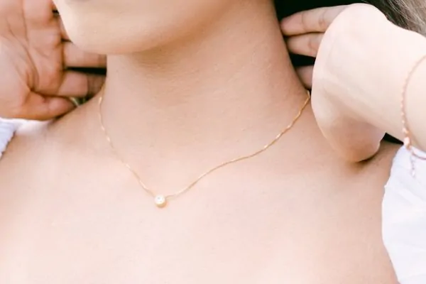 Close-up shot of a neck of a woman after having plastic surgery