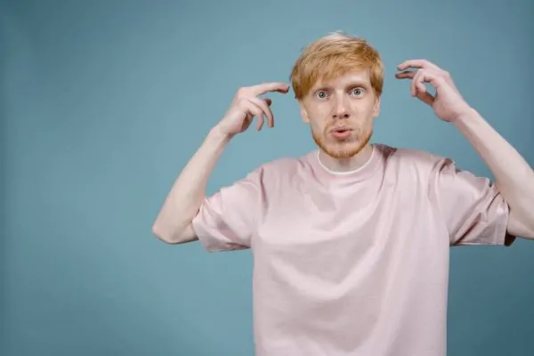 A confused man thinking of getting a Botox or a PDO thread
