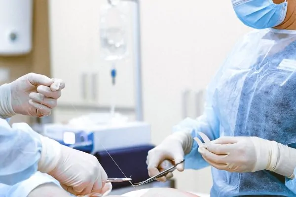 Cosmetic surgeons in action