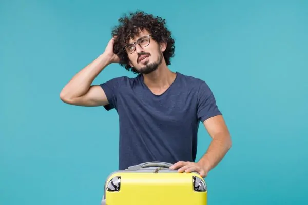 Man thinking hard if it is safe to fly right after receiving Botox