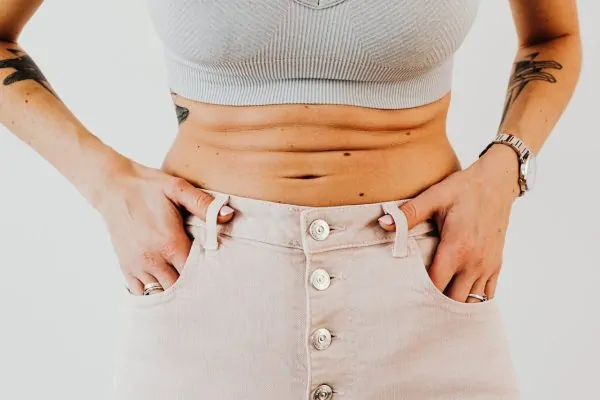 Stomach of a woman after getting liposuction