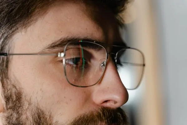 Close-up view of a man's nose after nasal plastic surgery