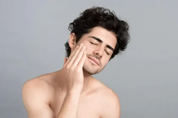 Man enjoying the results of his preventative Botox treatment
