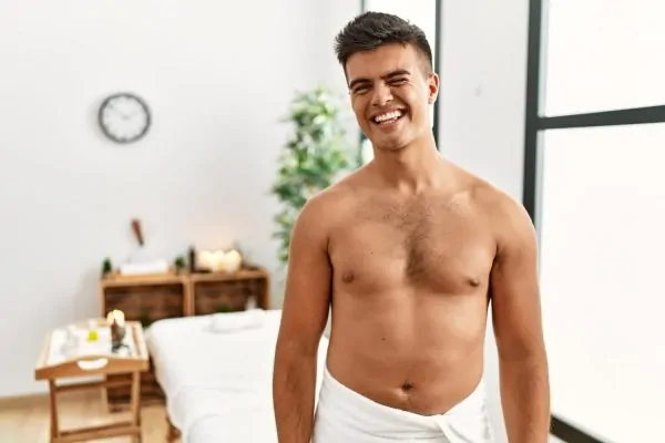 Man getting prepped for another liposuction procedure