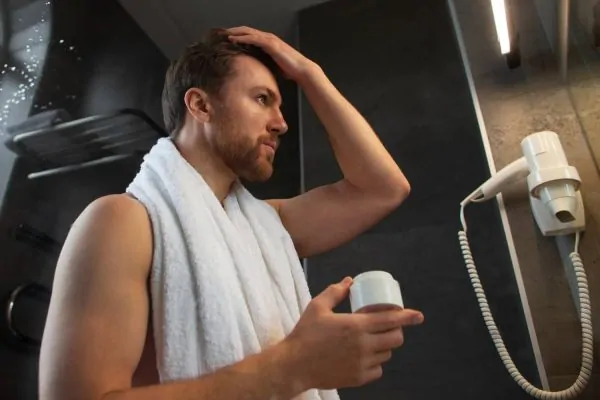 Man putting safe hair products after PDO thread lift