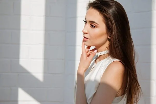 Woman posing after getting plastic surgery