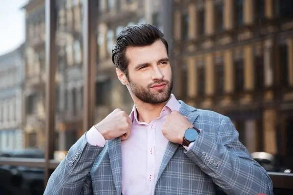 Man wearing a suit after getting a Botox injection