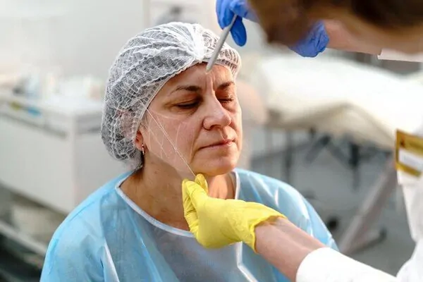 An old lady having a surgery