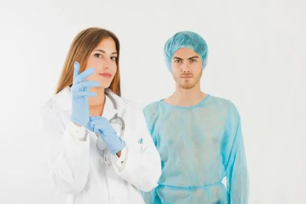 Plastic surgeon and patient ready for top aesthetic surgery procedures