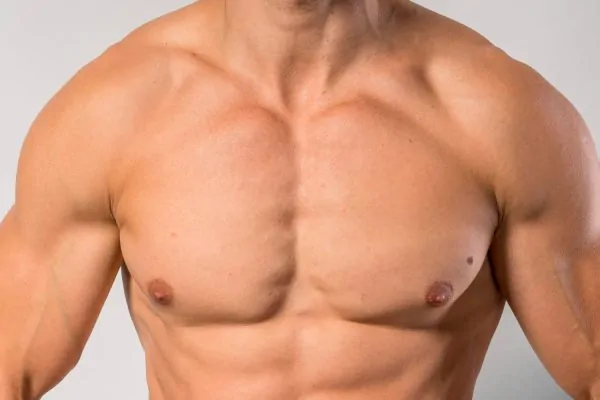 Visible six-pack abs from progressive core strengthening post-tummy tuck