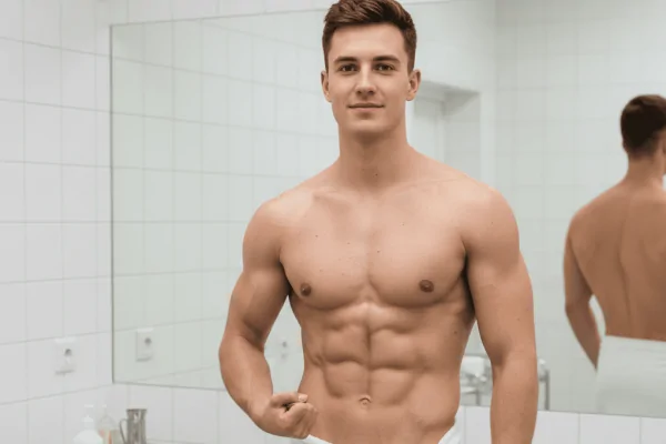 Young man dressed in towel