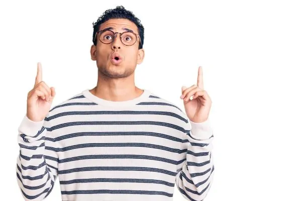 Young man raising awareness about important liposuction risks patients should know about