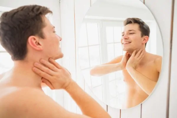 attractive man result of jawline fillers