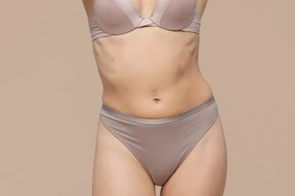 Beautiful woman tummy and wearing lingerie