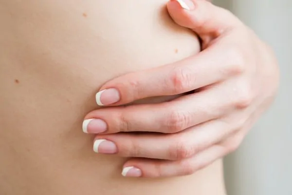 Close up woman's hand and body